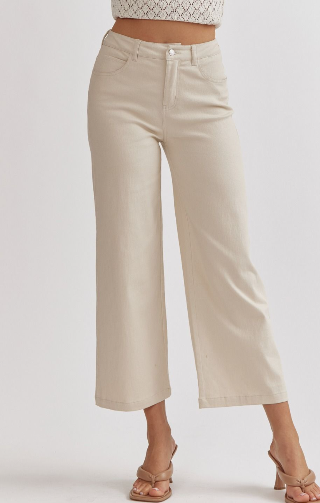 High waist wide leg pants made with smoke gray fabric asymmetrical